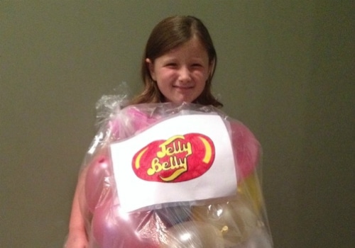 Girl wearing a homemade bag of jellybeans outfit